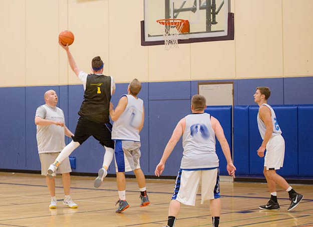 Mens basketball on the court action