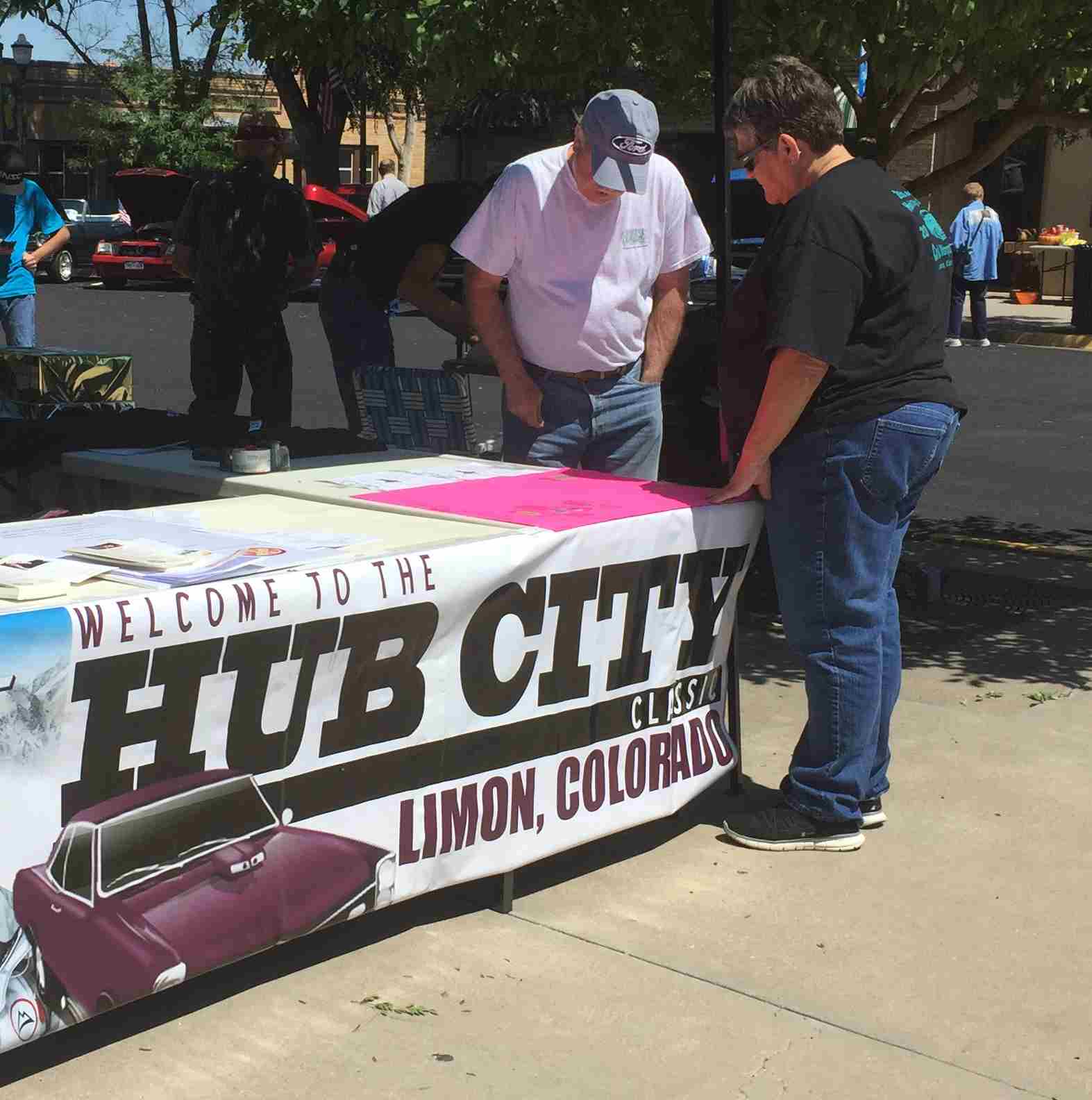 Automobiles and people at Hub City Classic in Limon